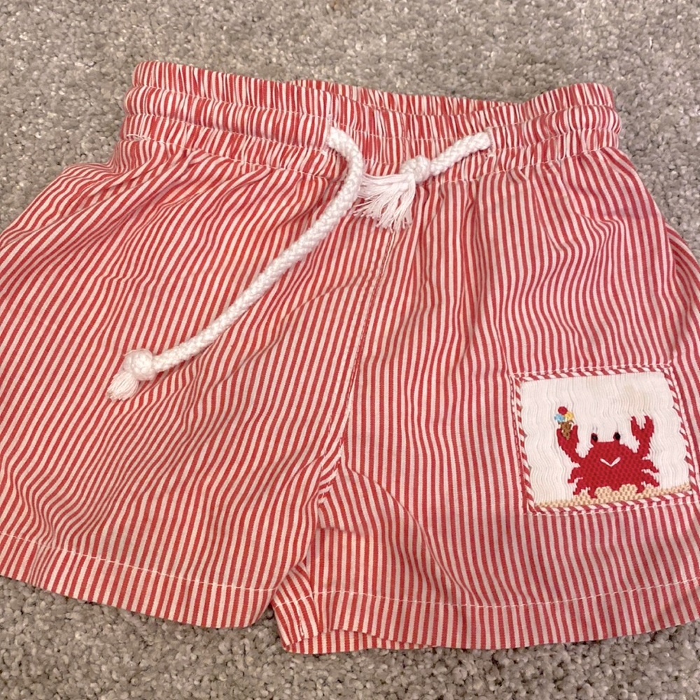 Red & white pin stripe baby swim trunks with smocked crab decal size 12 months
